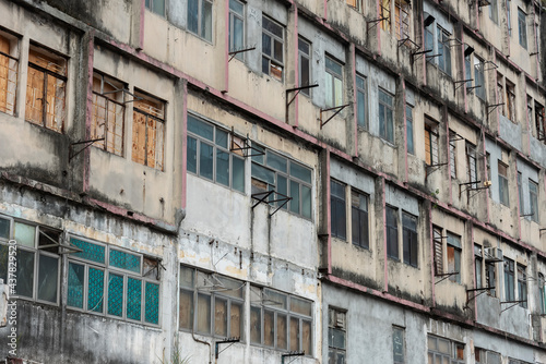 Exterior of abandoned residential building in Hong Kong city
