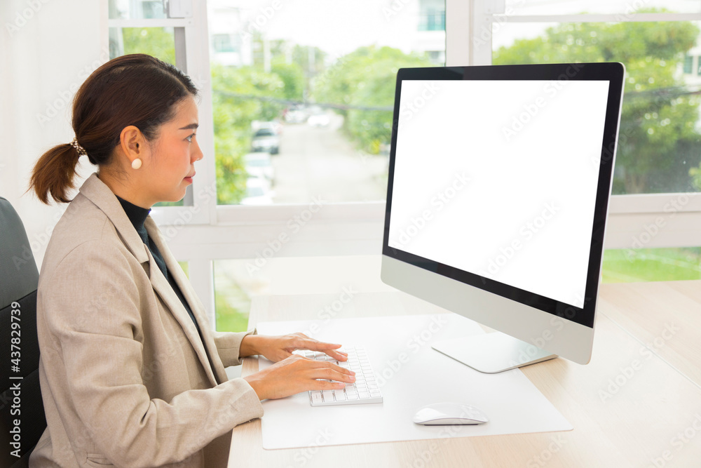 Beautiful Asian woman work from home, working on computer in living room at home. Social distancing lifestyle. Beautiful Asian woman work from home, working on computer in living room at home. Social distancing lifestyle.