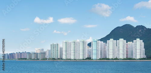 Panorama of residential district and harbor of Hong Kong city © leeyiutung