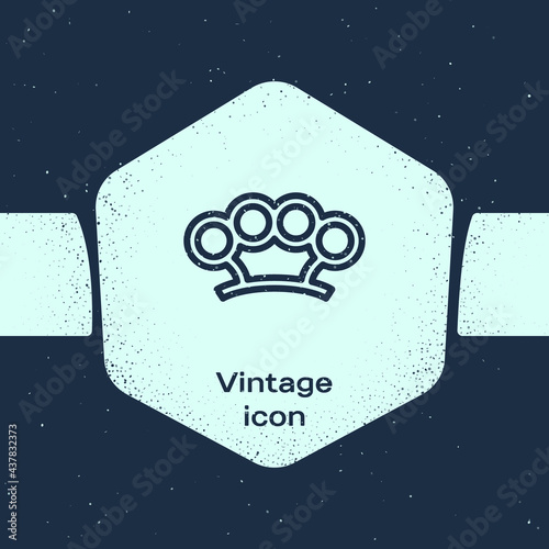 Grunge line Brass knuckles icon isolated on blue background. Monochrome vintage drawing. Vector