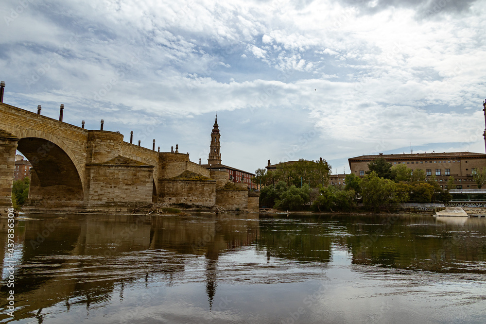 stone historic bridge over the Ebro river in Zaragoza spain