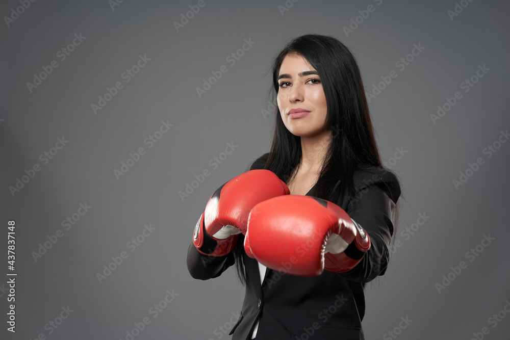 Latino businesswoman with fighting spirit Latino businesswoman with fighting spirit