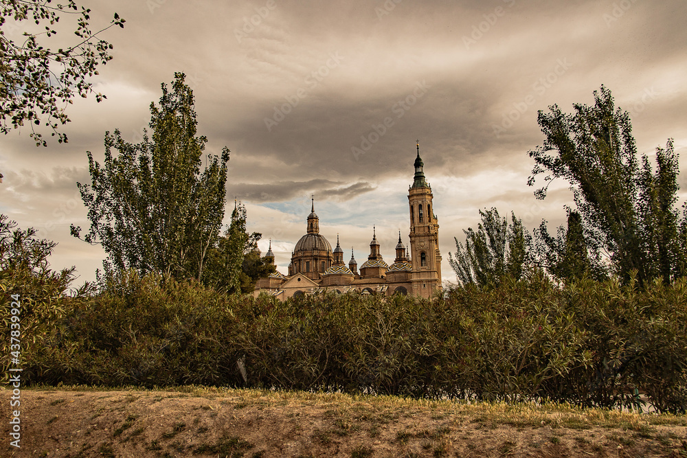 landscape from the spanish city of saragossa with basilica and trees
