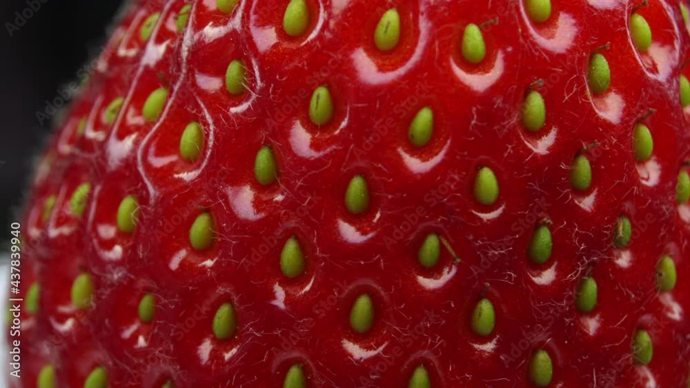 Strawberry is rotatind on black background. 4k Macro detail. Strawberry is rotatind on black background. 4k Macro detail.