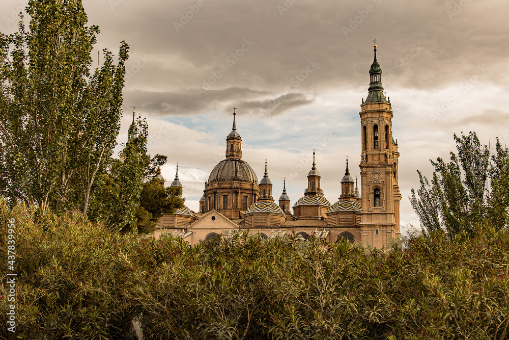landscape from the spanish city of saragossa with basilica and trees