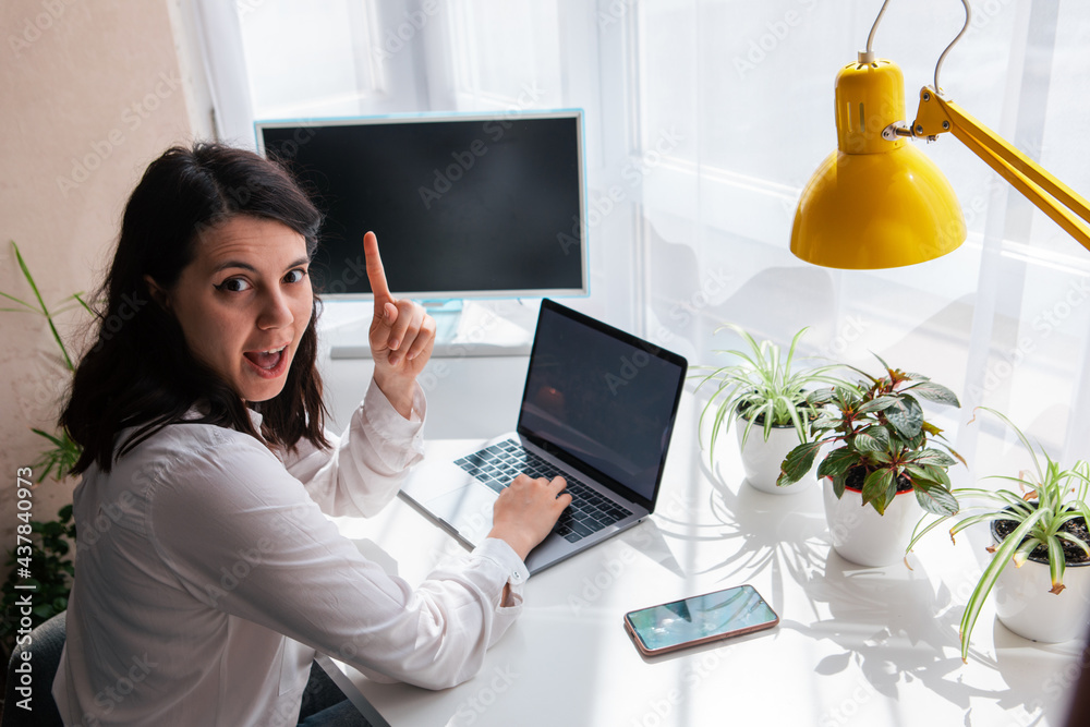 woman freelancer working on laptop white screen copy space woman freelancer working on laptop white screen copy space