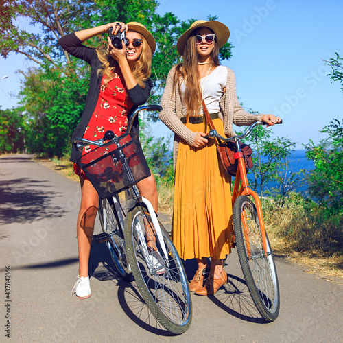 Outdoor sunny fashion portrait of two pretty funny girls ©  AnnaHar