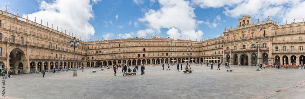 Panoramic view at the baroque public plaza, 18th century, Plaza Mayor in Salamanca downtown city, tourist people visiting