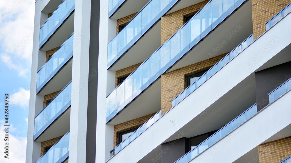 Cityscape with facade of a modern residential building. Modern European residential apartment building. Cityscape with facade of a modern residential building. Modern European residential apartment building.
