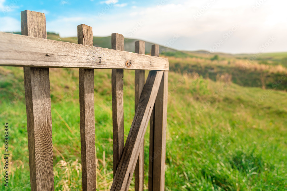 Beautiful rural landscape with wooden fence