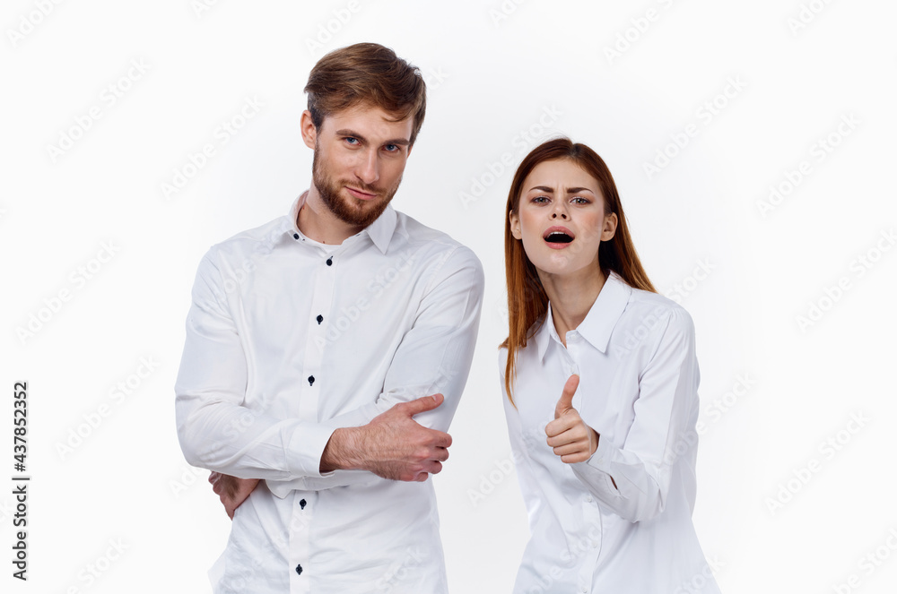 business finance employees at work man and woman in identical shirts business finance employees at work man and woman in identical shirts