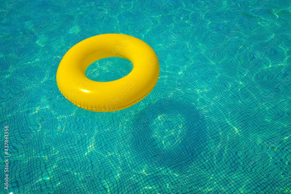 Colorful tube floating in a swimming pool