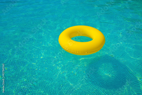 Colorful tube floating in a swimming pool
