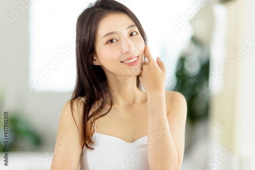 Smiling of cheerful beautiful pretty asian woman with clean fresh healthy skin