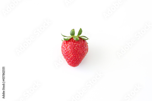 Natural and fresh single strawberry on white background, top view, copy space.