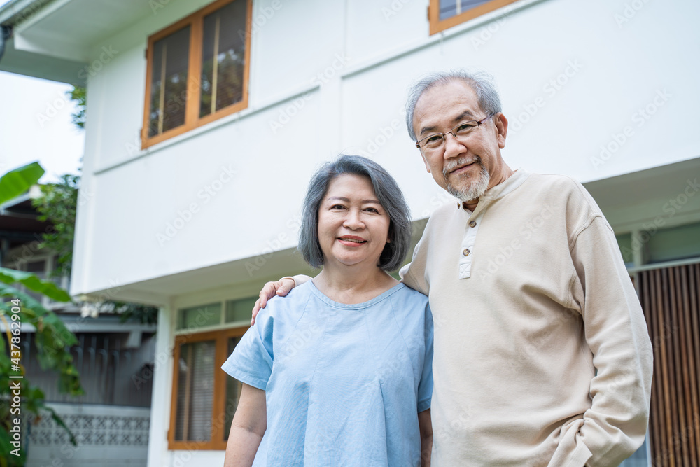 Portrait of Senior elderly grandparent couple at house look at camera Portrait of Senior elderly grandparent couple at house look at camera