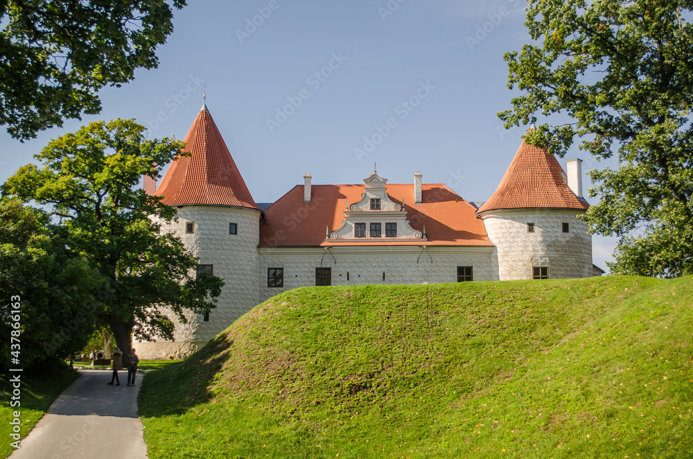 Bauska city castle in Latvia up in the hill. Sunny autumn day.