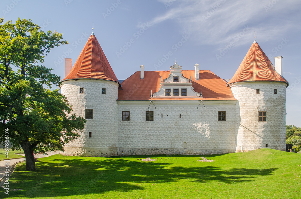 Bauska city castle in Latvia up in the hill. Sunny autumn day.