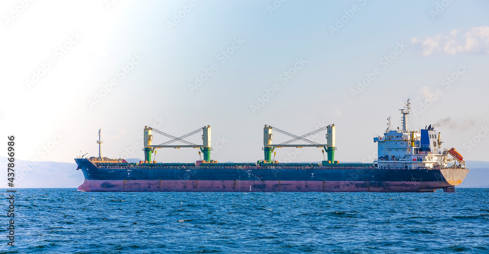 close up bulk cargo ship to harbor quayside Vladivostok