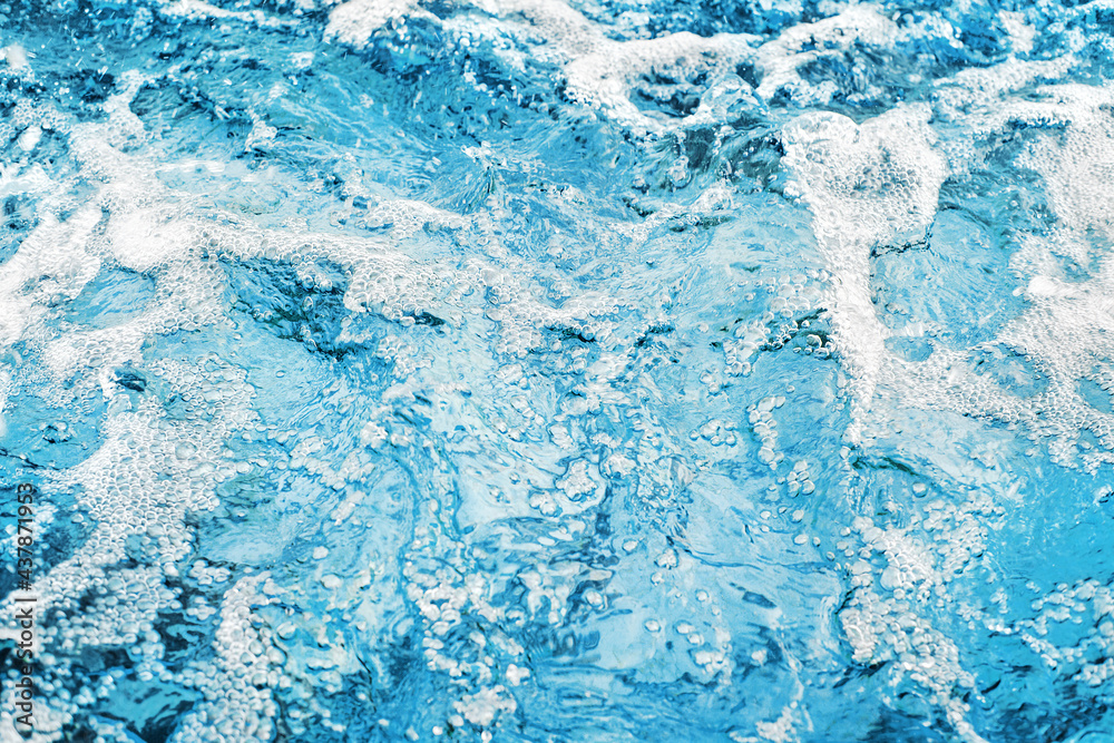 Fresh clear blue water texture closeup, sea waves pattern, ocean surface, transparent pure water splash, white foam bubbles, drops, clean aqua background, cool mineral drink water, art nature backdrop Fresh clear blue water texture closeup, sea waves pattern, ocean surface, transparent pure water splash, white foam bubbles, drops, clean aqua background, cool mineral drink water, art nature backdrop