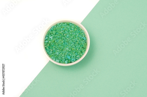 green bath salt on green white background