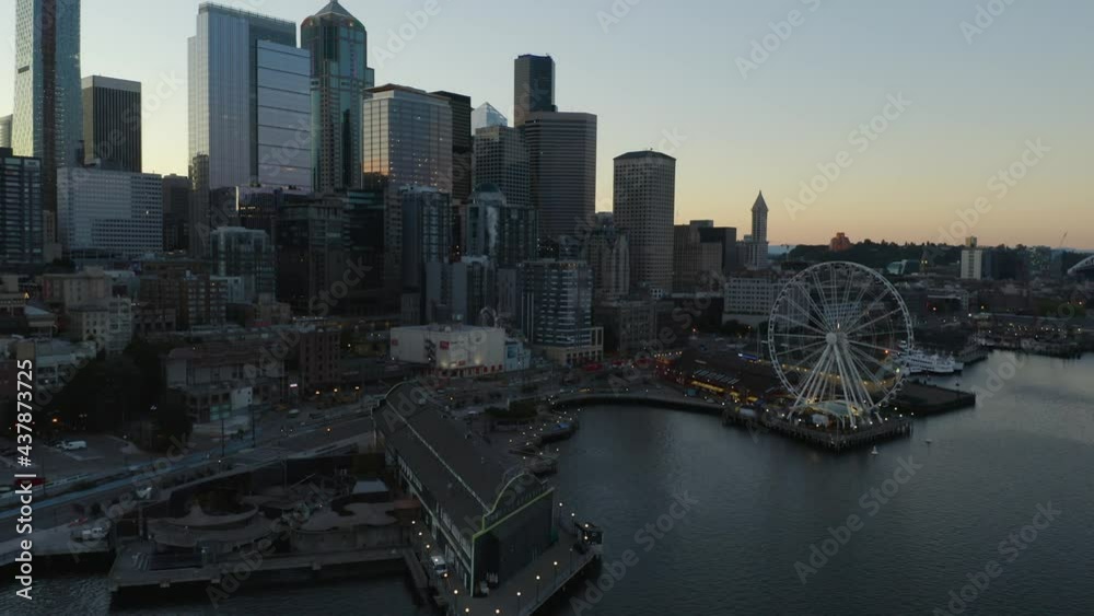 Drone Flies Above Seattle Pier and Elliott Bay at Sunrise. Drone Flies Above Seattle Pier and Elliott Bay at Sunrise.