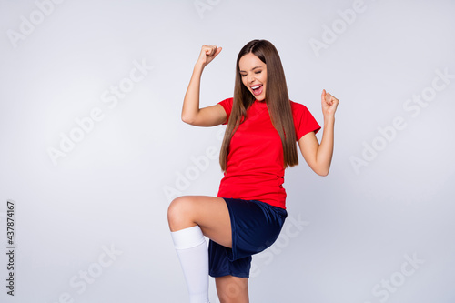 Canvas Print Yes we win Delighted crazy soccer player girl raise fists celebrate national uef