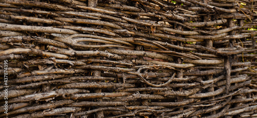 Wicker fence. Abstract background texture. Wattle has long been considered a symbol of comfort and measured rural life.