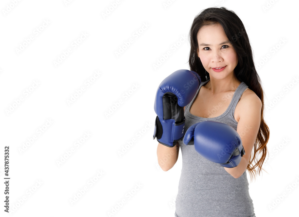 Confident sportive woman in boxing gloves Confident sportive woman in boxing gloves