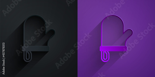 Paper cut Oven glove icon isolated on black on purple background. Kitchen potholder sign. Cooking glove. Paper art style. Vector