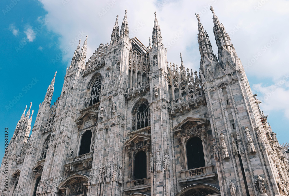 Front look of the Duomo cathedral Milan city on cloudy day.
