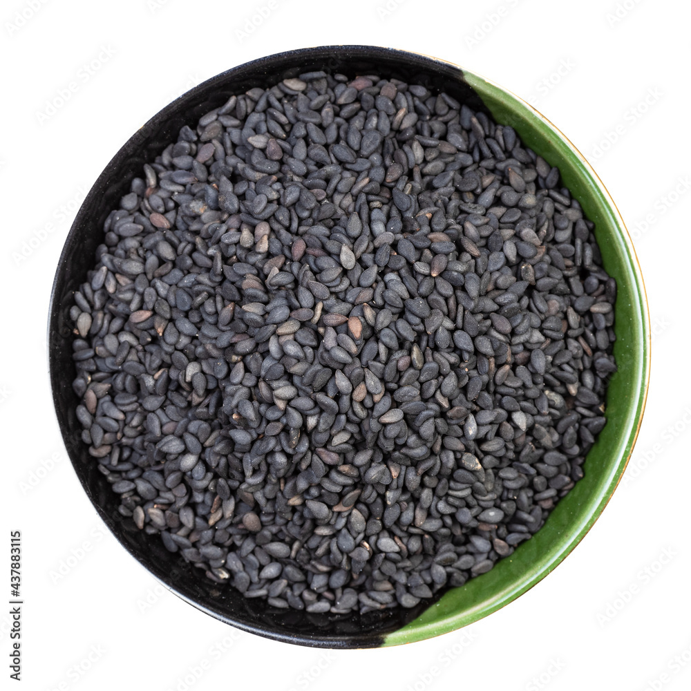 black sesame seeds in round bowl isolated black sesame seeds in round bowl isolated