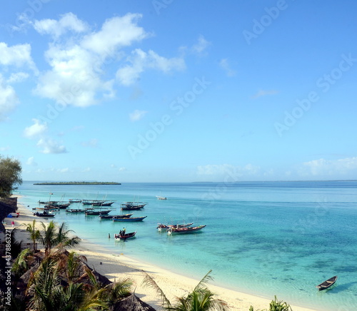 tropical landscape with ocean and boats 