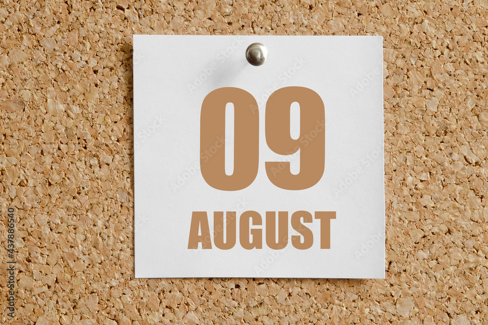 august 09. 09th day of the month, calendar date.White calendar sheet attached to brown cork board.Summer month, day of the year concept august 09. 09th day of the month, calendar date.White calendar sheet attached to brown cork board.Summer month, day of the year concept
