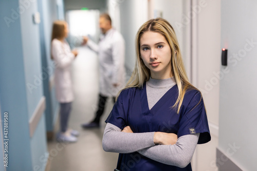 Attractive woman doctor in front of medical group © F8  \ Suport Ukraine