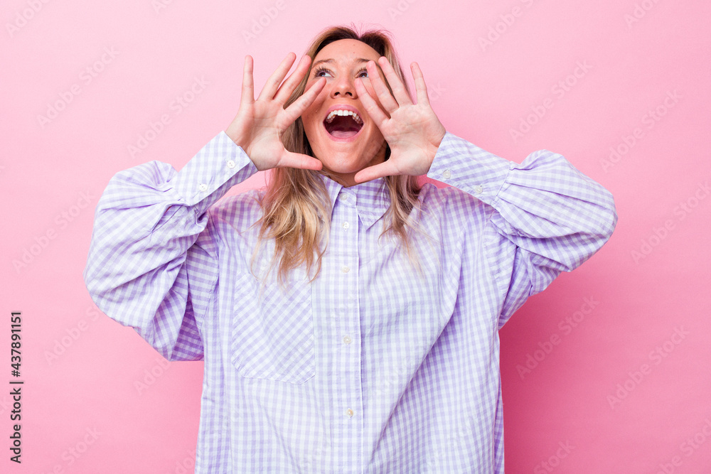Young australian woman isolated shouting excited to front.