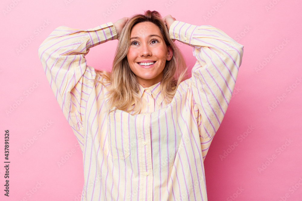 Young australian woman isolated celebrating a special day, jumps and raise arms with energy. Young australian woman isolated celebrating a special day, jumps and raise arms with energy.