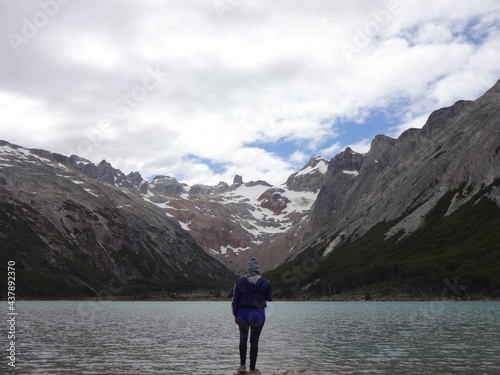 person standing on a lake