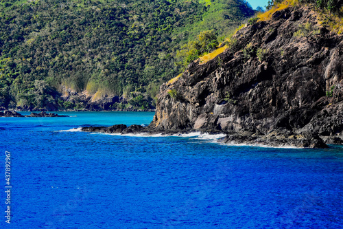 Former lava flows of Yangetta Island, showing the volcanic origin of the Fiji's Yasawa Islands located in the South Pacific