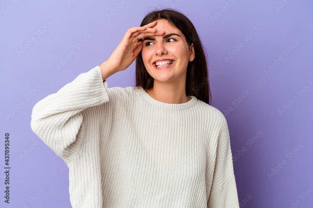 Young caucasian woman isolated on purple background joyful laughing a lot. Happiness concept. Young caucasian woman isolated on purple background joyful laughing a lot. Happiness concept.
