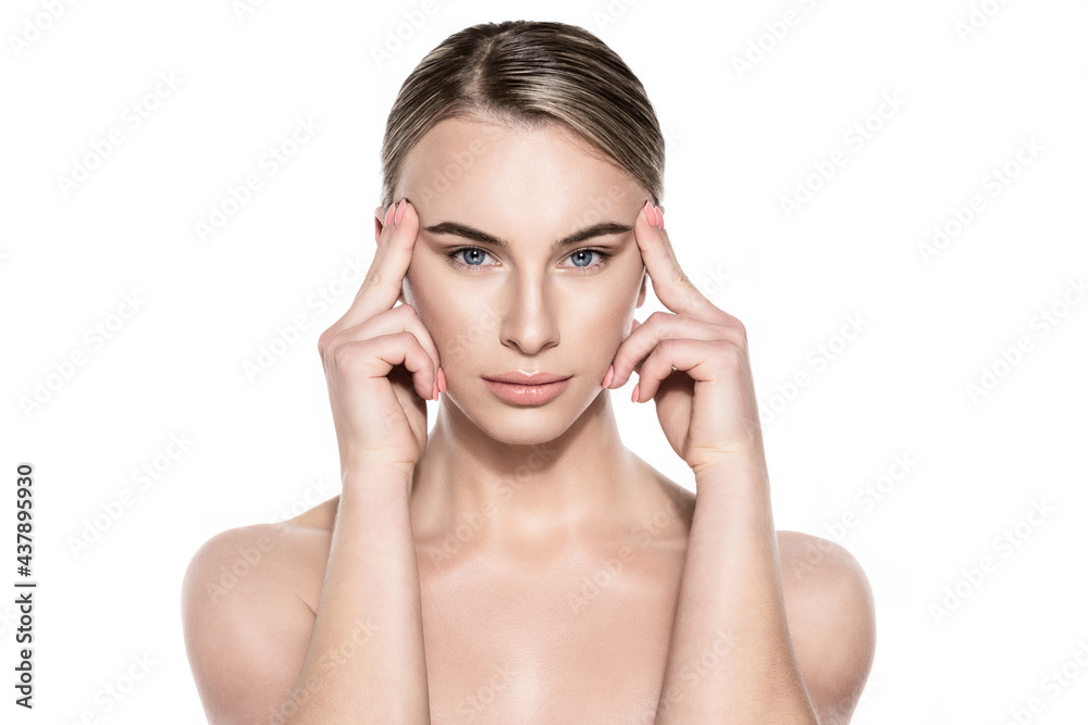 Beautiful Young Blond Woman with Perfect Skin touching her face. Facial treatment. Cosmetology, beauty, anti aging concept. Isolated on white background. Beautiful Young Blond Woman with Perfect Skin touching her face. Facial treatment. Cosmetology, beauty, anti aging concept. Isolated on white background.