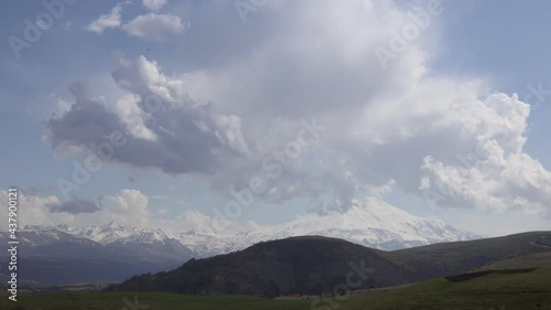 Timelapse 4k, Full HD, Elbrus And Green Hills with road. Dzhili-Su, Republic of Kabardino-Balkaria, North Caucasus, Russia.