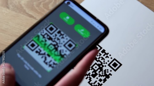 Scanning QR code with mobile smart phone. Qr code payment, E wallet , cashless technology concept.