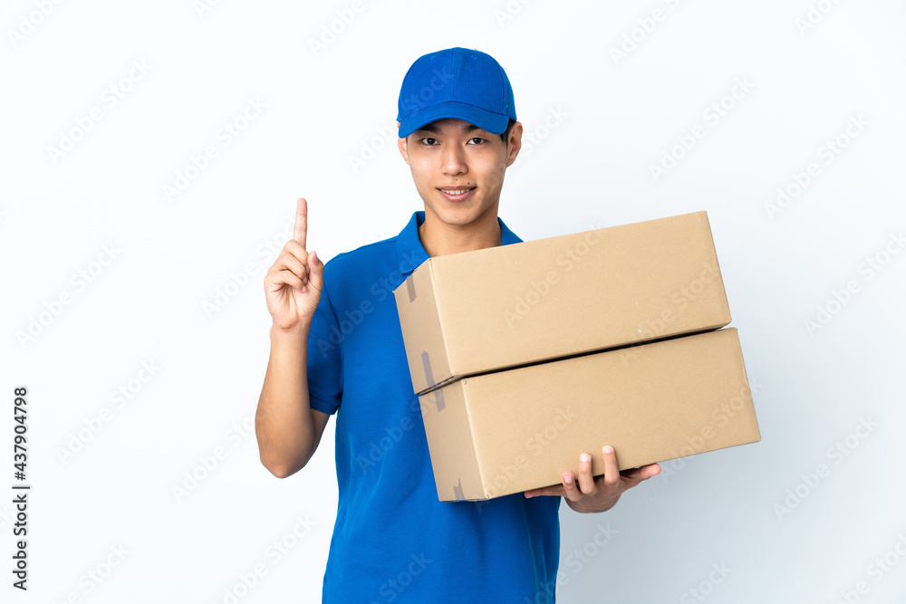 Delivery Chinese man isolated on white background pointing up a great idea Delivery Chinese man isolated on white background pointing up a great idea
