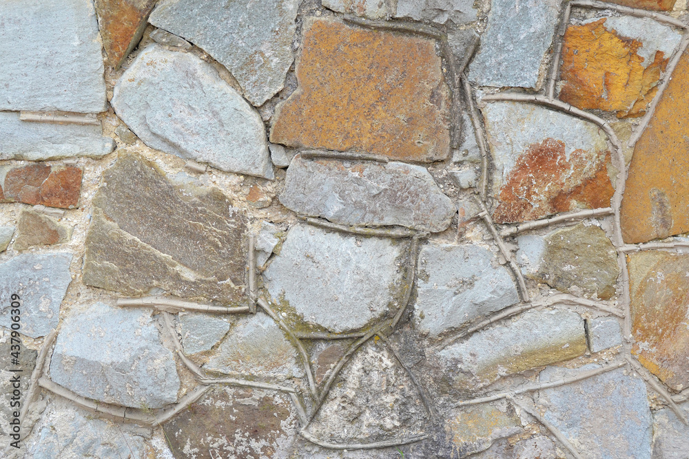 Texture of stone wall with mosaic tiles. Texture of stone wall with mosaic tiles.