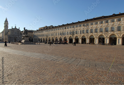 San Carlo square is the living room of Turin. It is famous for its yellow palaces, the equestrian monumet caval'd brons, the churches San Carlo and Santa Cristina. photo