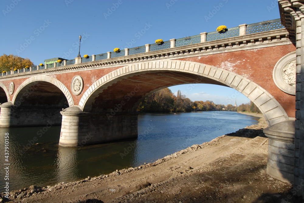 The river Po in Turin through the historic center of the city and you can see the Mole Antonelliana, the Valentino castle, the Isabella bridge. The river Po in Turin through the historic center of the city and you can see the Mole Antonelliana, the Valentino castle, the Isabella bridge.