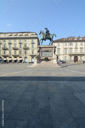 Piazza Bodoni with the elegant buildings and the equestrian monument dedicated to Alfonso Ferrero Della Marmora.