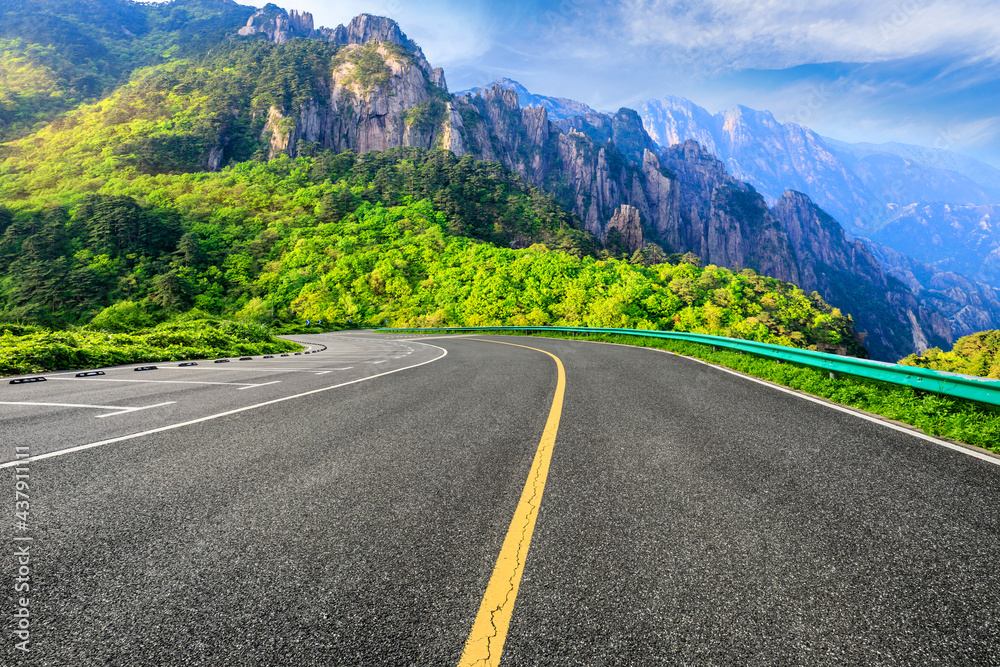 Fototapeta premium Mountain road natural landscape on a sunny day.