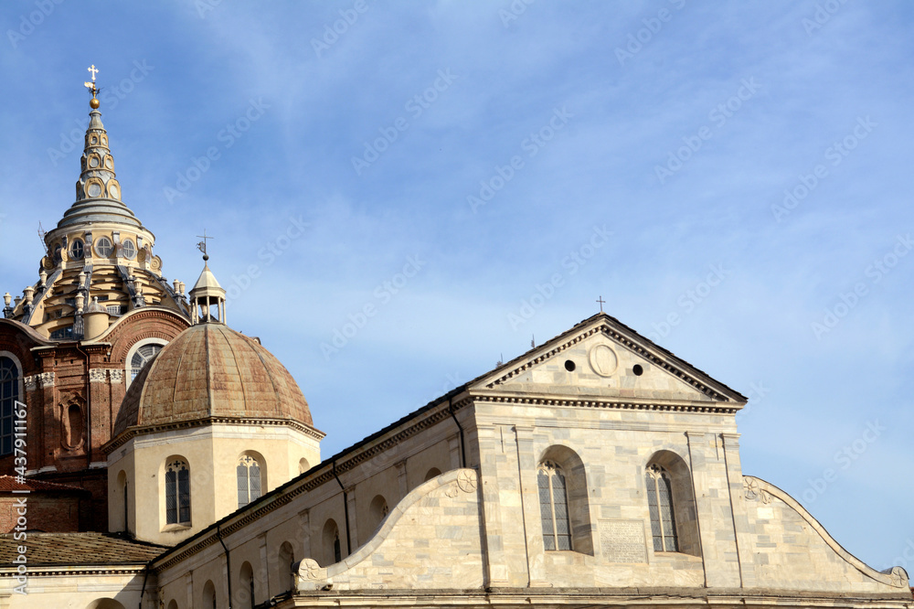 from the Roman walls of the Palatine Gates the panorama of the Cathedral and its bell tower, the Chapel of the Holy Shroud and the dome of San Lorenzo.